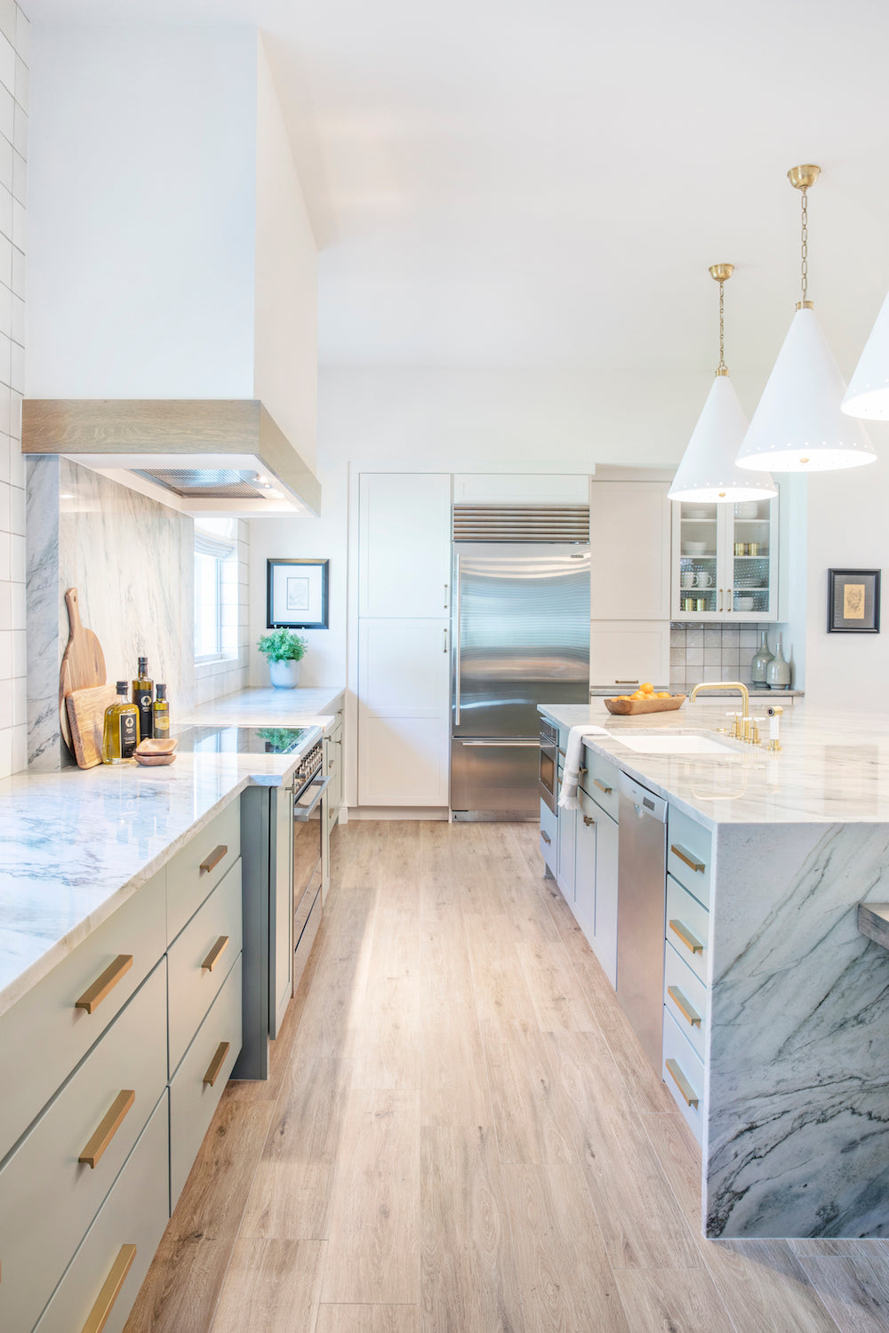A coastal inspired kitchen with zellige tile and serene blues by Lisa & Leroy.