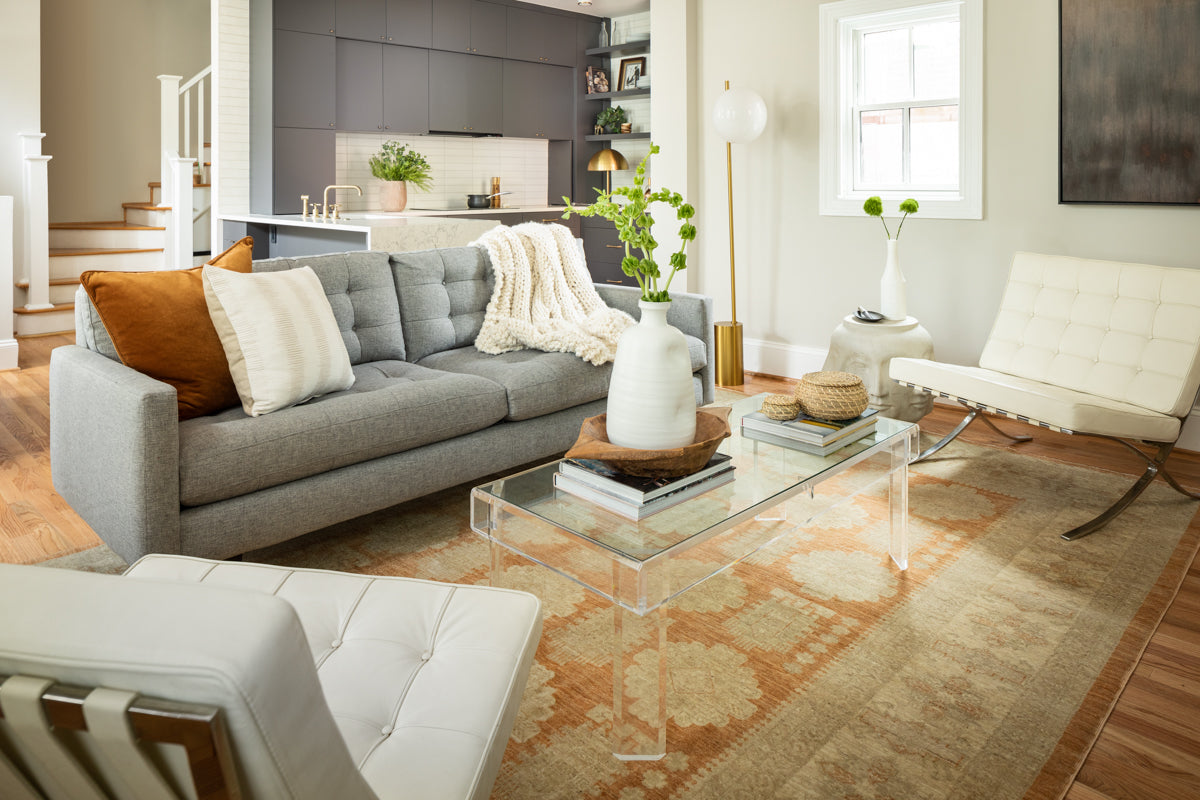 An airy and light-filled living area with layered neutrals by Lisa & Leroy.