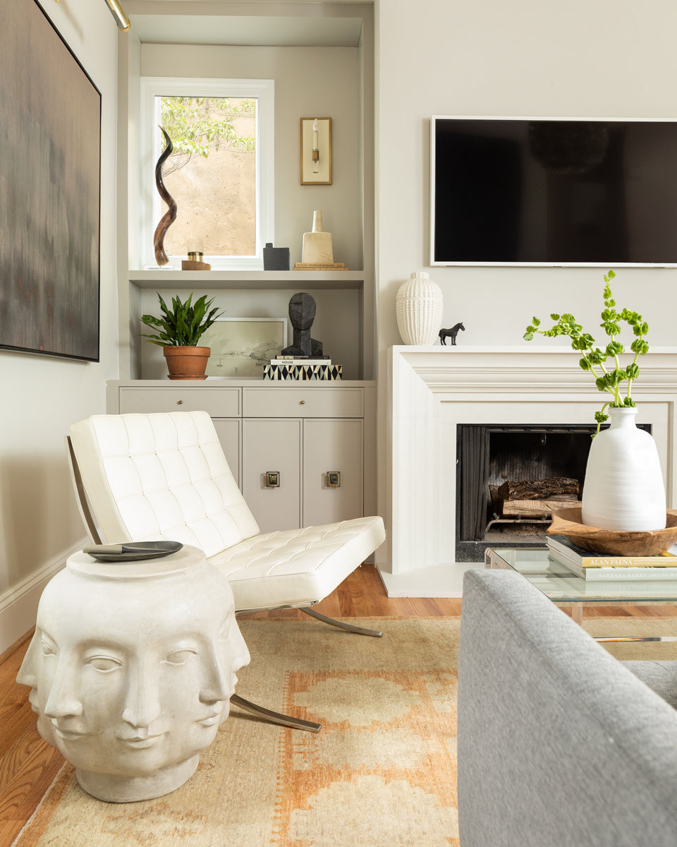An airy and light-filled living area with layered neutrals by Lisa & Leroy.