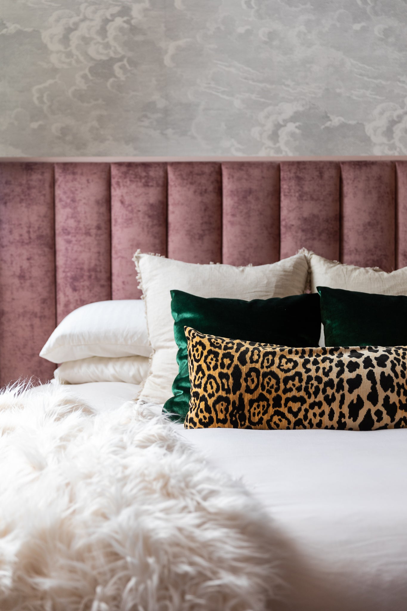 A modern, feminine, eclectic bedroom in shades of pink by Lisa & Leroy.