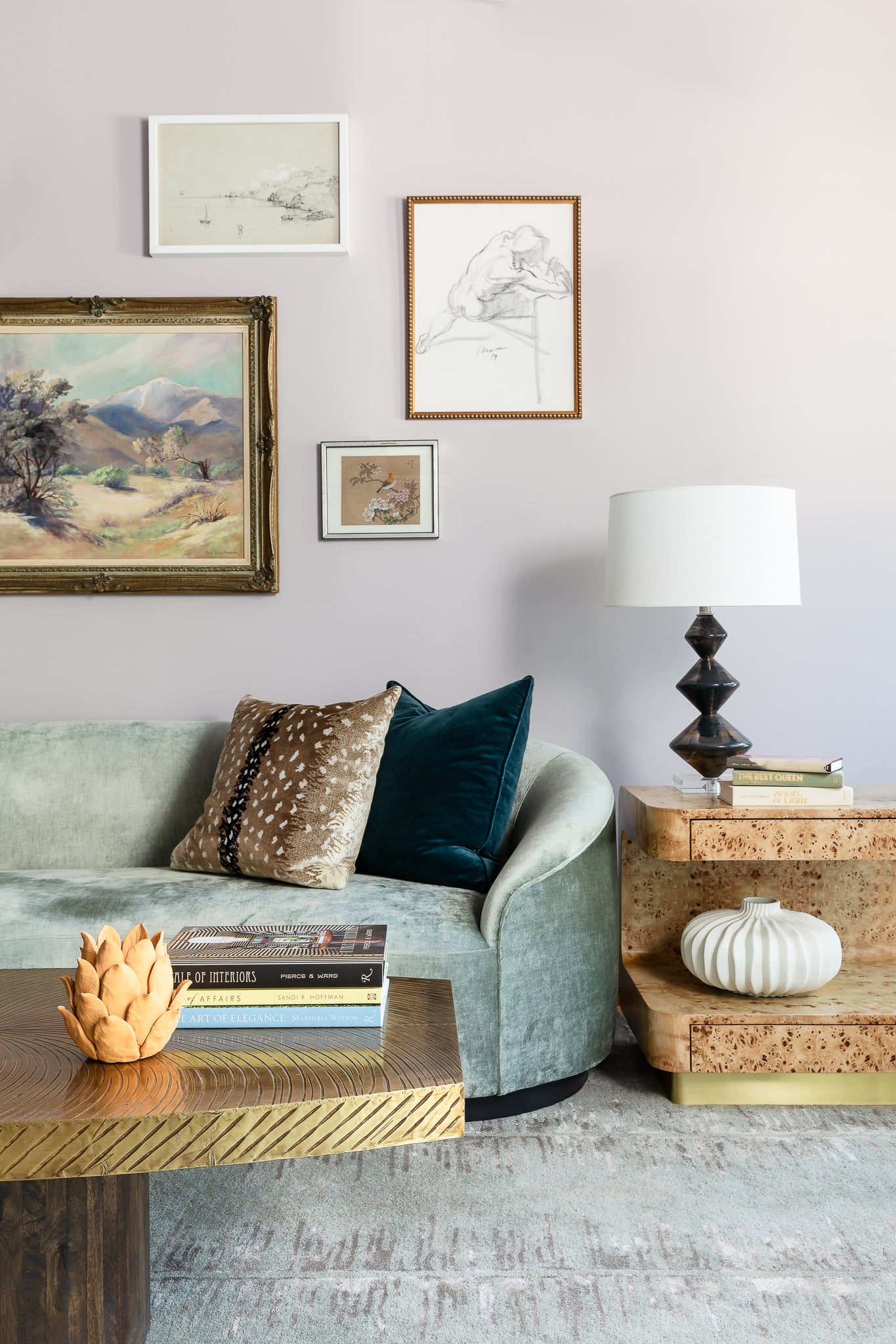 A living area by Lisa & Leroy, featuring luxe textures, wood tones, and a mix of soft and bold hues.