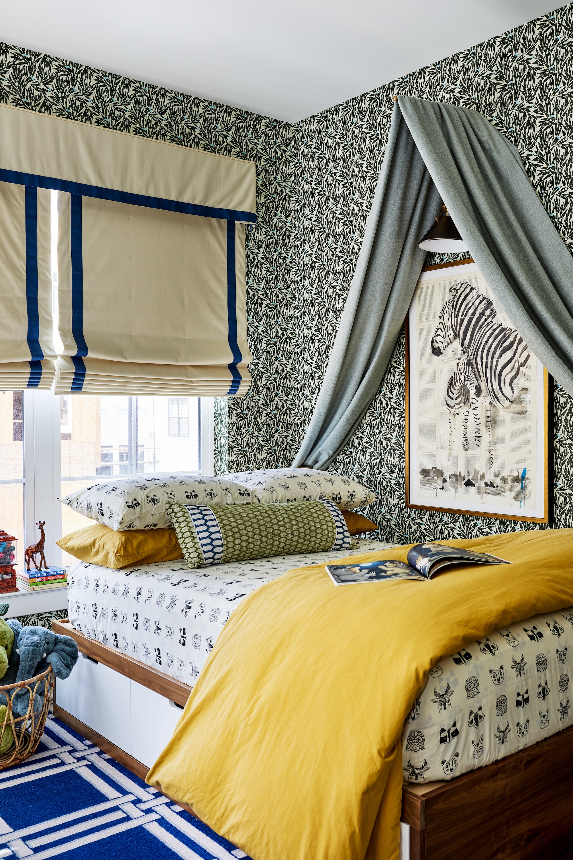 An artfully-layered bedroom of textures, tones, and patterns by Lisa & Leroy.